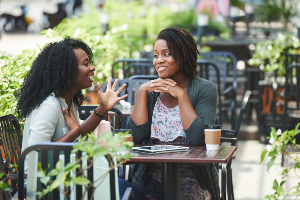 young black women talking - USC Center for Artificial Intelligence in ...